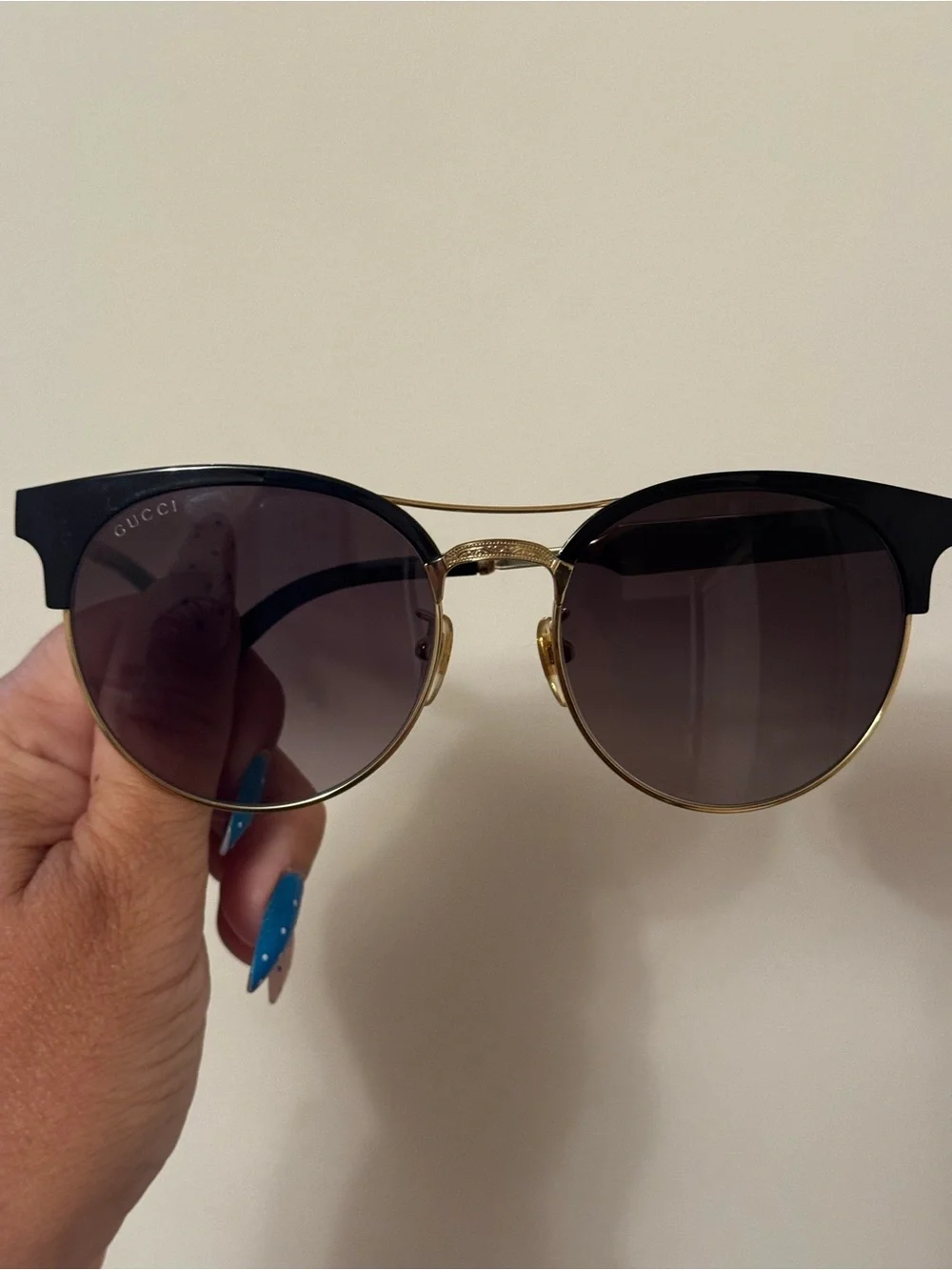Gucci Women’s Black and Gold Round Sunglasses with Gradient Lenses